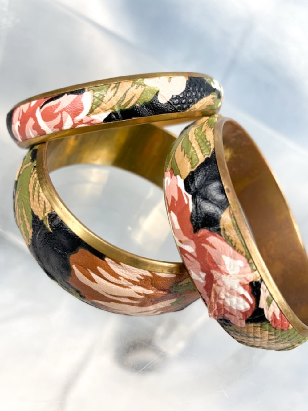 Embossed + painted leather and brass bangle bracelets